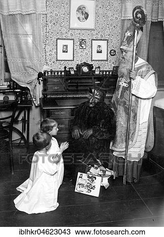 Nikolaus visits two children ca. 1930, exact place unknown, Germany, Europe View Large Photo Image Stock Image - Nikolaus visits two children ca. 1930, exact place unknown, Germany, Europe. Fotosearch