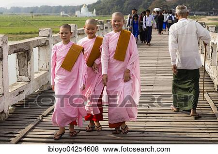 Nuns on U-Bein Bridge, the longest Teak-Wood Bridge in the world, Amarapura, Mandalay, Myanmar, Asia View Large Photo Image Stock Photo - Nuns on U-Bein Bridge, the longest Teak-Wood Bridge in the world, Amarapura, Mandalay, Myanmar, Asia. Fotosearch