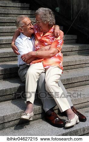 Stock Photography - Old couple cuddling, Berlin, Germany, Europe. Fotosearch