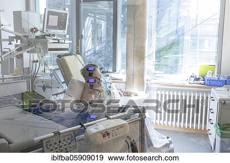 Stock Photo - Patient in the intensive care unit for Covid patients, Hospital Agatharied, Agatharied, Bavaria, Germany, Europe. Fotosearch