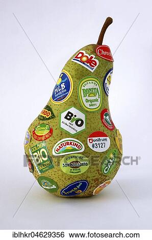 Stock Photograph - Pear with many stickers, certifications and logos stuck on. Fotosearch