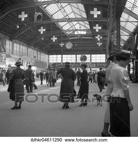 People at a railway station, ca. 1950, Switzerland, Europe View Large Photo Image Stock Image - People at a railway station, ca. 1950, Switzerland, Europe. Fotosearch