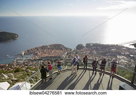 People enjoying the view of Dubrovnik from the viewing platform on Mount Srd, Brdo Srd, Dubrovnik, Croatia, Europe View Large Photo Image Stock Image - People enjoying the view of Dubrovnik from the viewing platform on Mount Srd, Brdo Srd, Dubrovnik, Croatia, Europe. Fotosearch