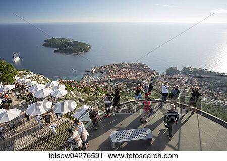 People enjoying the view of Dubrovnik and Lokrum Island from the viewing platform on Mount Srd, Brdo Srd, Dubrovnik, Croatia, Europe View Large Photo Image Stock Image - People enjoying the view of Dubrovnik and Lokrum Island from the viewing platform on Mount Srd, Brdo Srd, Dubrovnik, Croatia, Europe. Fotosearch