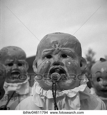 People with baby masks, carnival, around 1950, around Freiburg, Germany, Europe View Large Photo Image Picture - People with baby masks, carnival, around 1950, around Freiburg, Germany, Europe. Fotosearch
