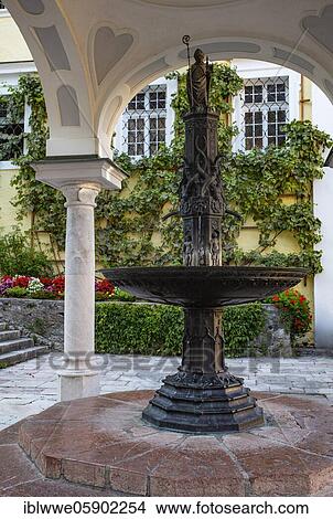 Picture - Pilgrims Fountain, Sankt Wolfgang Pilgrimage Church, Sankt Wolfgang am Wolfgangsee, Salzkammergut, Upper Austria, Austria, Europe. Fotosearch