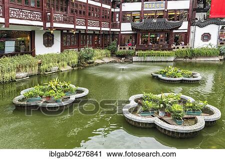 Stock Image - Pond in the Yu Yuan Gardens, Pudong, old city, Shanghai, China, Asia. Fotosearch