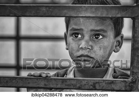 Stock Photo - Portrait of kid, little boy, Pushkar, Rajasthan, India, Asia. Fotosearch