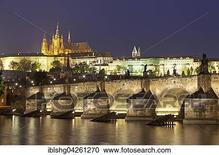 Stock Image - Prague Castle with Charles Bridge at night, Moldova, Prague, Czech Republic, Europe. Fotosearch