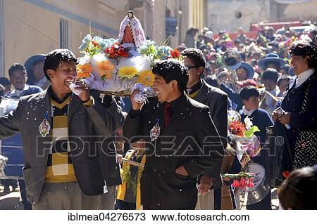 Stock Image - Procession during a fiesta in Colquechaca in Potosi, Bolivia, South America. Fotosearch