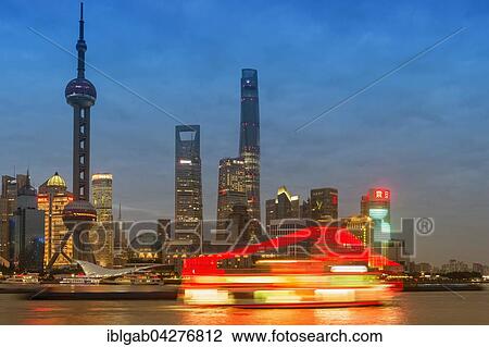 Stock Image - Pudong financial district with Oriental Pearl Tower at night, Shanghai, China, Asia. Fotosearch