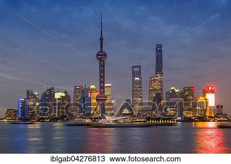 Stock Image - Pudong financial district with Oriental Pearl Tower at night, Shanghai, China, Asia. Fotosearch