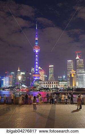 Stock Photo - Pudong financial district with Oriental Pearl Tower at night, Shanghai, China, Asia. Fotosearch