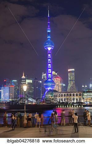 Stock Photo - Pudong financial district with Oriental Pearl Tower at night, Shanghai, China, Asia. Fotosearch
