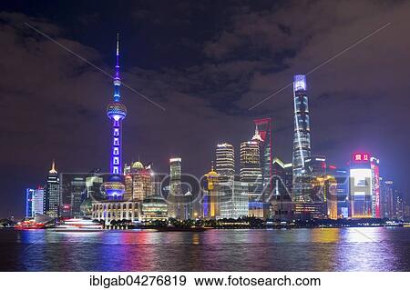 Stock Photo - Pudong financial district with Oriental Pearl Tower at night, Shanghai, China, Asia. Fotosearch