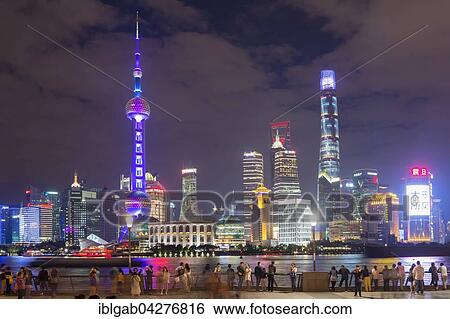 Stock Photograph - Pudong financial district with Oriental Pearl Tower at night, Shanghai, China, Asia. Fotosearch