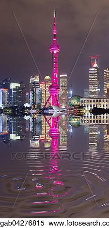 Stock Photography - Pudong financial district with Oriental Pearl Tower at night, Shanghai, China, Asia. Fotosearch