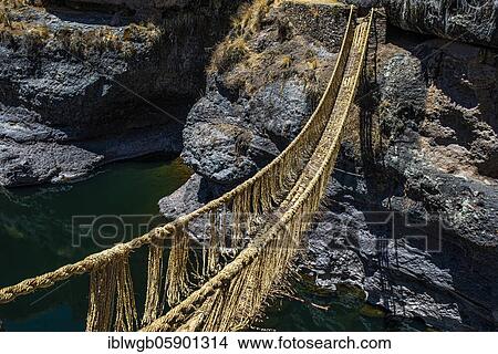 Picture - Qu'eswachaka suspension bridge, rope bridge made of woven Peruvian Feathergrass (Stipa ichu), over the Apurimac River, last known working Inca suspension bridge, national cultural heritage of Peru, Southern Peru, Peru, South America. Fotosearch