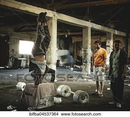 Refugees, Afghani, Pakistani youth, abandoned department store, Belgrade, Serbia, Europe View Large Photo Image Picture - Refugees, Afghani, Pakistani youth, abandoned department store, Belgrade, Serbia, Europe. Fotosearch