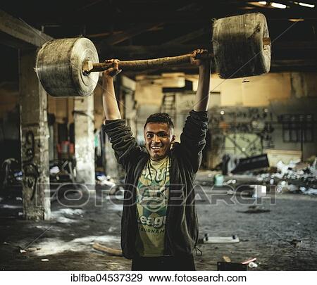 Refugees, Afghani, Pakistani youth, abandoned department store, Belgrade, Serbia, Europe View Large Photo Image Stock Photo - Refugees, Afghani, Pakistani youth, abandoned department store, Belgrade, Serbia, Europe. Fotosearch