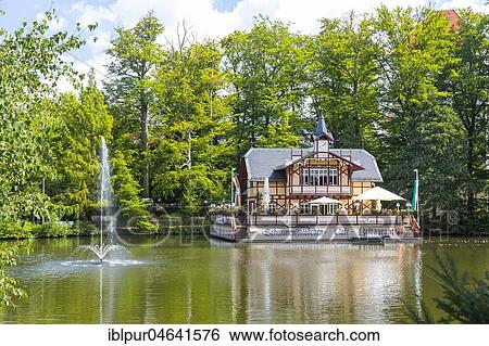 Restaurant Schwanenschlößchen on the Kreuzteich in Freiberg, Saxony, Germany, Europe View Large Photo Image Stock Photograph - Restaurant Schwanenschlößchen on the Kreuzteich in Freiberg, Saxony, Germany, Europe. Fotosearch