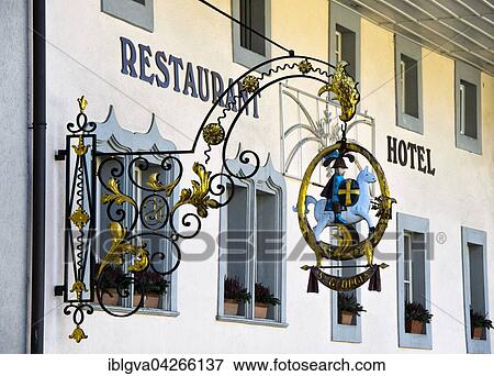 Restaurant sign with the horse-rider St. Georg, Hostellerie Saint-Georges, Gruyeres, Canton of Fribourg, Switzerland, Europe View Large Photo Image Stock Photo - Restaurant sign with the horse-rider St. Georg, Hostellerie Saint-Georges, Gruyeres, Canton of Fribourg, Switzerland, Europe. Fotosearch