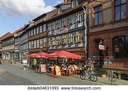 Stock Image - Row of houses with gastronomy, Breite Straße, Wernigerode, Saxony-Anhalt, Germany, Europe. Fotosearch