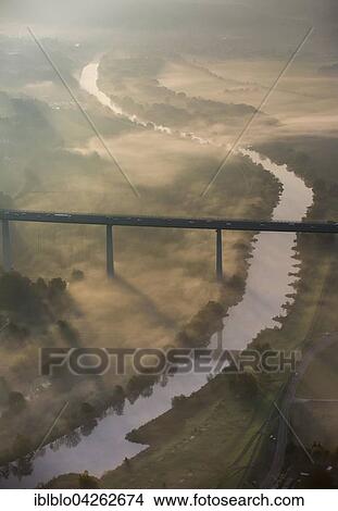 Ruhr viaduct over Ruhr, Bundesautobahn A52, fog in autumn, Mulheim, Mintard, Ruhr district, North Rhine-Westphalia, Germany, Europe View Large Photo Image Picture - Ruhr viaduct over Ruhr, Bundesautobahn A52, fog in autumn, Mulheim, Mintard, Ruhr district, North Rhine-Westphalia, Germany, Europe. Fotosearch