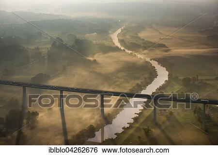 Stock Photograph - Ruhr viaduct over Ruhr, Bundesautobahn A52, fog in autumn, Mulheim, Mintard, Ruhr district, North Rhine-Westphalia, Germany, Europe. Fotosearch