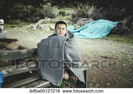 Stock Photo - Sabsali, 14, from Baglan, Afghanistan, arrived at Skala Sykamneas on 5. 3. 2020, Lesbos, Greece, Asia. Fotosearch