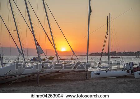Sailboats at sunset, Robinson Club Pamfilya, Side-Sorgun, Side Belediyesi, Antalya, Turkey, Asia View Large Photo Image Picture - Sailboats at sunset, Robinson Club Pamfilya, Side-Sorgun, Side Belediyesi, Antalya, Turkey, Asia. Fotosearch