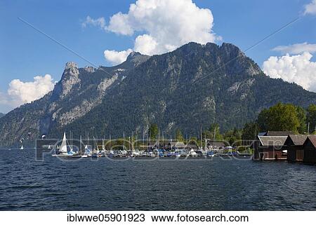 Stock Image - Sailing boats at Lake Lake Traun with Erlakogel, Ebensee, Salzkammergut, Upper Austria, Austria, Europe. Fotosearch