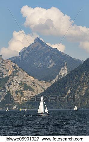 Stock Photo - Sailing boats at the Lake Traun with Hochkogel, Ebensee, Salzkammergut, Upper Austria, Austria, Europe. Fotosearch