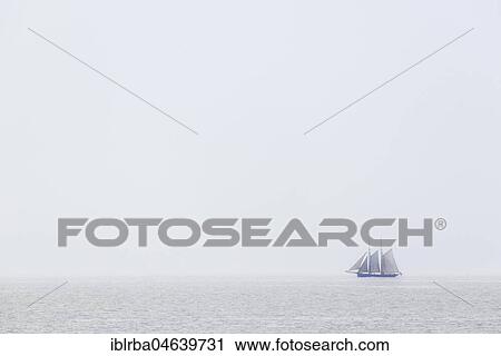 Sailing ship, two master on the North Sea with fog, Norderney, East Frisian Islands, Lower Saxony, Germany, Europe View Large Photo Image Stock Image - Sailing ship, two master on the North Sea with fog, Norderney, East Frisian Islands, Lower Saxony, Germany, Europe. Fotosearch