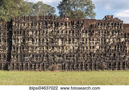 Stock Image - Sandstone relief on the base of Terrace of the Leper King, Angkor Thom, Cambodia, Asia. Fotosearch