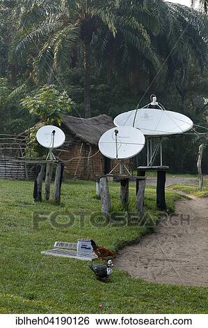 Stock Photograph - Satellite dishes, battery with solar panels, Matamba-Solo, Bandundu Province, Congo-Brazzaville, Africa. Fotosearch