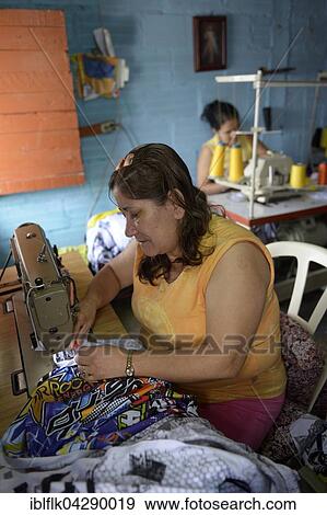 Seamstresses in Comuna 8 slum, Medellin, Antioquia Department, Colombia, South America View Large Photo Image Stock Photo - Seamstresses in Comuna 8 slum, Medellin, Antioquia Department, Colombia, South America. Fotosearch