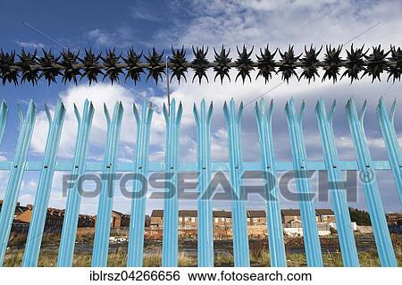 Security fence in West Belfast, Northern Ireland View Large Photo Image Stock Photograph - Security fence in West Belfast, Northern Ireland. Fotosearch