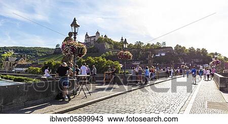 Serving Franconian wine at bar tables, Brückenschoppen, Alte Mainbrücke, Würzburg, Franconia, Bavaria, Germany, Europe View Large Photo Image Stock Image - Serving Franconian wine at bar tables, Brückenschoppen, Alte Mainbrücke, Würzburg, Franconia, Bavaria, Germany, Europe. Fotosearch