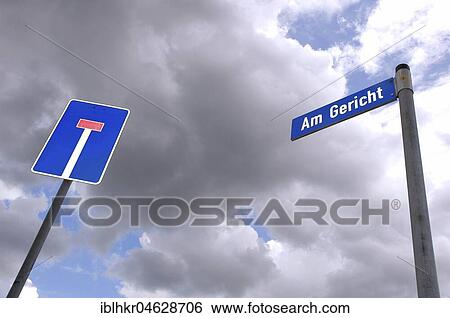 Stock Photograph - Shields dead end and dish, dark clouds, Germany, Europe. Fotosearch