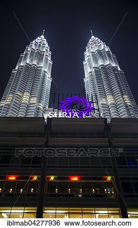 Stock Photograph - Shopping mall, Suria KLCC, Petronas Towers at night, Kuala Lumpur, Malaysia, Asia. Fotosearch