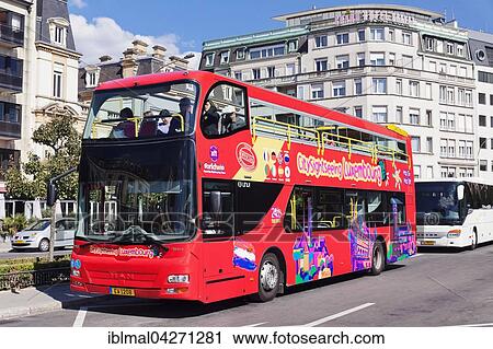 Sightseeing bus, Place de la Constitution, Luxembourg City, Grand Duchy of Luxembourg View Large Photo Image Stock Image - Sightseeing bus, Place de la Constitution, Luxembourg City, Grand Duchy of Luxembourg. Fotosearch