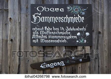 Sign on an old forge, Obere Hammerschmiede, Bad Oberdorf in Bad Hindelang, Allgau, Bavaria, Germany, Europe View Large Photo Image Stock Photo - Sign on an old forge, Obere Hammerschmiede, Bad Oberdorf in Bad Hindelang, Allgau, Bavaria, Germany, Europe. Fotosearch