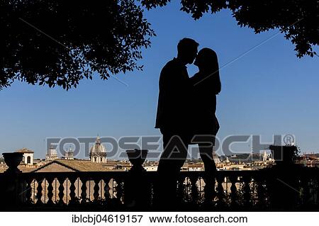 Silhouette couple kissing in Rome, Italy, Europe View Large Photo Image Stock Photo - Silhouette couple kissing in Rome, Italy, Europe. Fotosearch