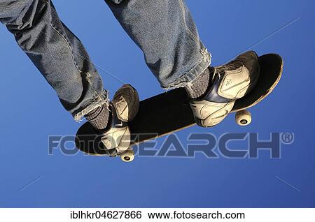 Skateboarder makes a big jump, Germany, Europe View Large Photo Image Stock Photograph - Skateboarder makes a big jump, Germany, Europe. Fotosearch