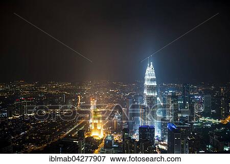 Skyline at night, Petronas Towers, Kuala Lumpur, Malaysia, Asia View Large Photo Image Stock Photo - Skyline at night, Petronas Towers, Kuala Lumpur, Malaysia, Asia. Fotosearch