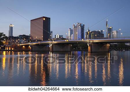 Skyline with office buildings, high-rise buildings at dusk, Untermainkai, Peace Bridge, Frankfurt am Main, Hesse, Germany, Europe View Large Photo Image Picture - Skyline with office buildings, high-rise buildings at dusk, Untermainkai, Peace Bridge, Frankfurt am Main, Hesse, Germany, Europe. Fotosearch