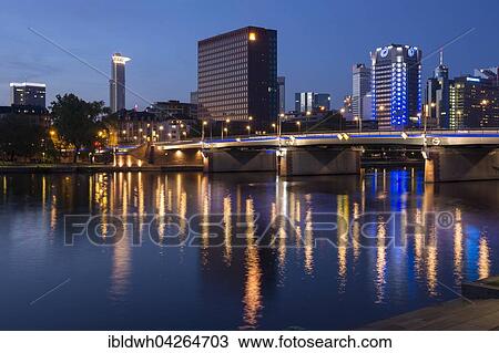 Skyline with office buildings, high-rise buildings at dusk, Untermainkai, Peace Bridge, Frankfurt am Main, Hesse, Germany, Europe View Large Photo Image Stock Image - Skyline with office buildings, high-rise buildings at dusk, Untermainkai, Peace Bridge, Frankfurt am Main, Hesse, Germany, Europe. Fotosearch