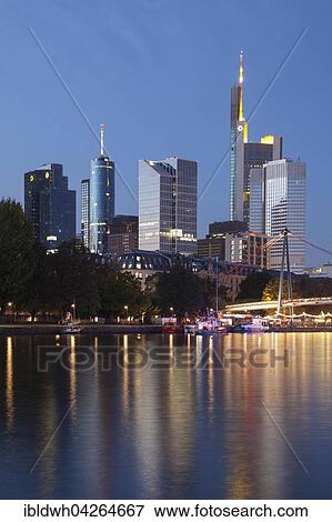Stock Photo - Skyline with office buildings, high-rise buildings at dusk on Untermainkai, Financial District, Frankfurt am Main, Hesse, Germany, Europe. Fotosearch
