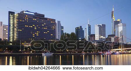 Skyline with office buildings, high-rise buildings at dusk, Untermainkai, Frankfurt am Main, Hesse, Germany, Europe View Large Photo Image Stock Photograph - Skyline with office buildings, high-rise buildings at dusk, Untermainkai, Frankfurt am Main, Hesse, Germany, Europe. Fotosearch